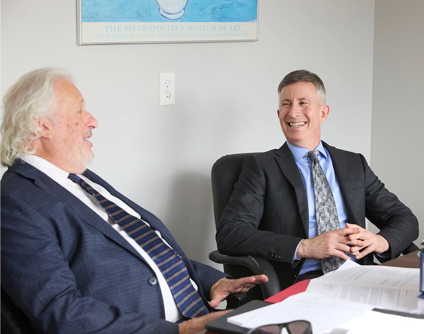 Attorney Gary D. Ginsberg and Attorney Adam M. Raditz